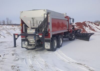 Sander truck with plow